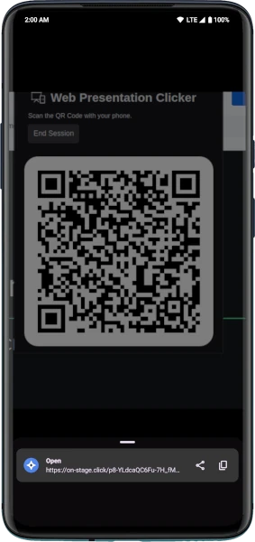 A phone with the camera app open, scanning the extension's QR Code. A link pops up on the bottom.